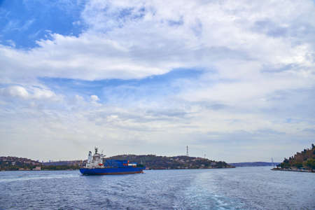cargo ship with containers goes on bosforの写真素材