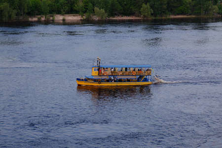 small pleasure ship on the river in Kyivの写真素材