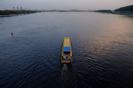 small pleasure ship on the river in Kyivの写真素材