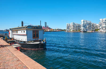 Modern buildings on the bank of the canal in Copenhagen, Denmark.の写真素材
