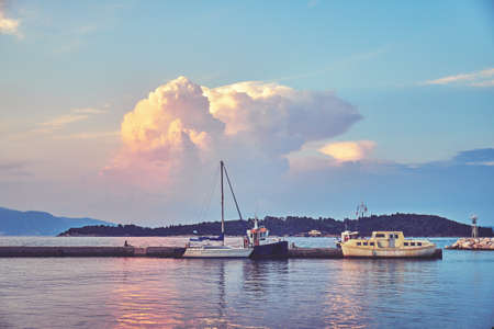 A large beautiful cloud over the island of Corfu, Greeceの写真素材