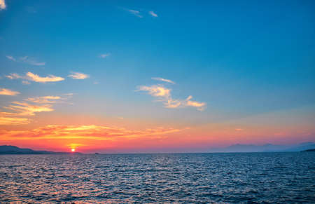 View of the sunset over Greece from Albania. The Ionian Sea.の写真素材