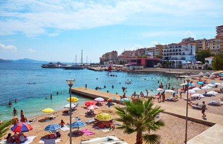 Albania, Saranda - August 15, 2018:  View of the city beach in summer in the holiday seasonのeditorial素材