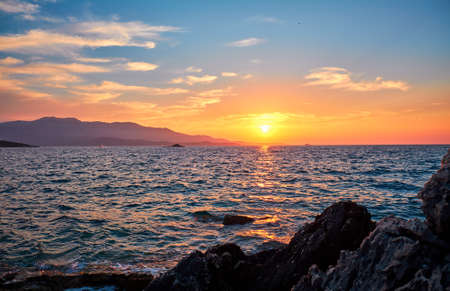 View of the sunset over Greece from Albania. The Ionian Sea.の写真素材