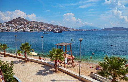 Albania, Saranda - August 15, 2018:  View of the city beach in summer in the holiday seasonのeditorial素材