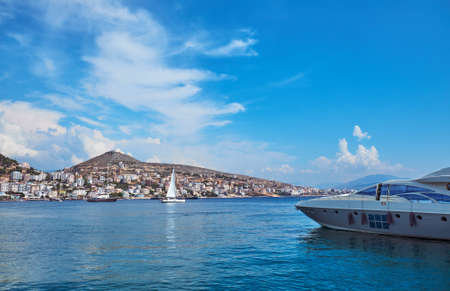 View of the shore of Saranda from the sea during the holiday season. Albaniaの写真素材