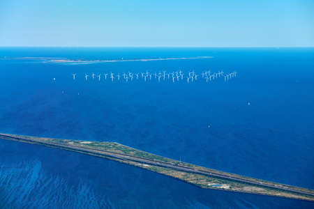 wind farm is a group of wind turbinesの写真素材