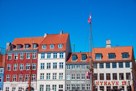 Denmark, Copenhagen - Jule 2, 2018: Nyhavn is a 17th-century waterfront, canal and entertainment districtのeditorial素材