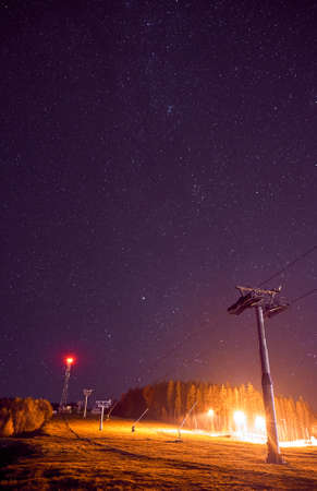 Beautiful landscape. Night sky with stars in the Carpathian mountains.の写真素材
