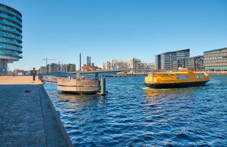 Denmark, Copenhagen - July 1, 2018: city ferry approaches the shore