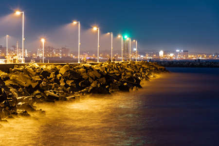 city ?? lights in the port die diving at night in long exposure