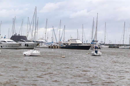 Punta del Este port with its boats and fast moorings. beautiful place to walkの写真素材