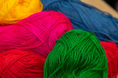 wool in various colors for fabric and crafts at home or at schoolの写真素材