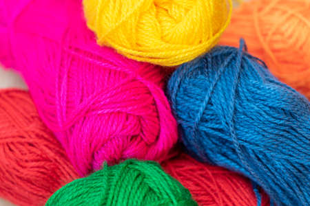 wool in various colors for fabric and crafts at home or at schoolの写真素材