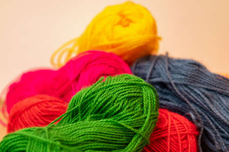 wool in various colors for fabric and crafts at home or at schoolの写真素材