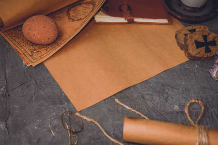 old keys and symbols in wood and with little natural lightの写真素材