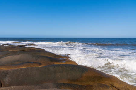 rocks on the oceanic coast of the Atlantic in Uruguay in unforgettable rideの写真素材