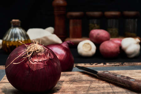 raw vegetables on stone and wooden table to cook in a healthy and natural way