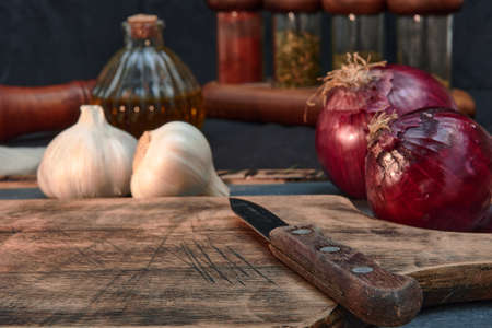 raw vegetables on stone and wooden table to cook in a healthy and natural wayの写真素材