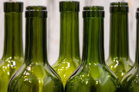 Empty foreground bottles of colors and alcohol for decoration