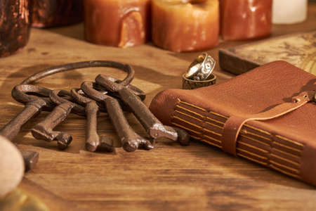 scented candles and other items on rustic wooden tableの写真素材