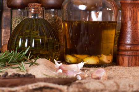 ingredients like spices and olive oil to flavor foodの写真素材