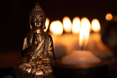 image in Buddhist temple next to candlesの写真素材