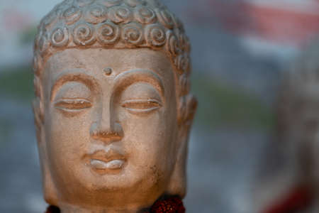 Buddha statue in the temple, close-up of faceの写真素材