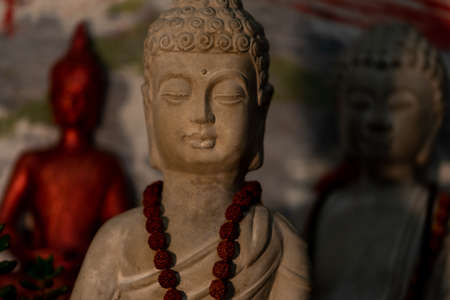 Buddha statue in a Buddhist temple, close-up.の写真素材