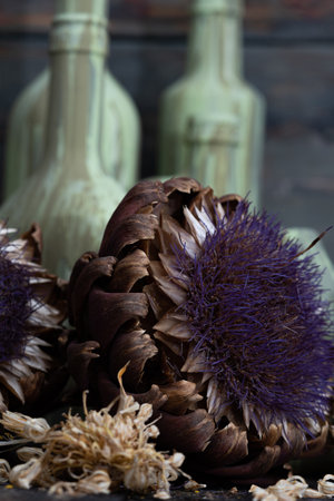 artichokes on a dark wooden background. tinting. selective focusの写真素材