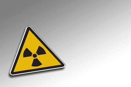 Radioactive warning sign over gradient background - including clipping path for the warning signの写真素材