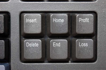 Profit & Loss - close up of Keyboard showing a key for each Profit and Lossの写真素材