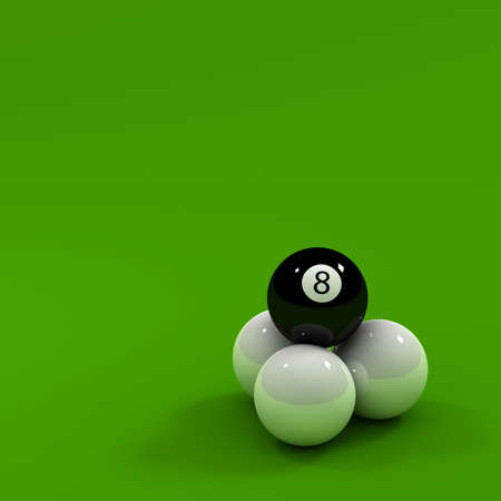 Eight ball sitting on three white balls over white reflective surfaceの写真素材