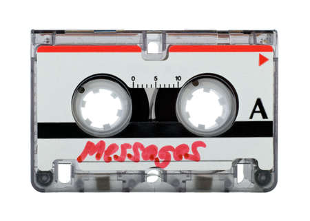 Cassette tape from answering machine over white backgroundの写真素材