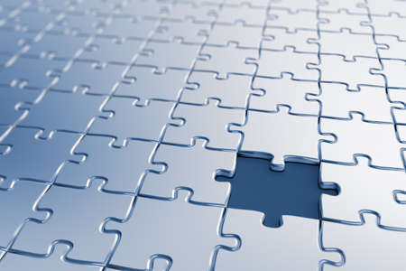Blank puzzle with a missing piece - shallow depth of field