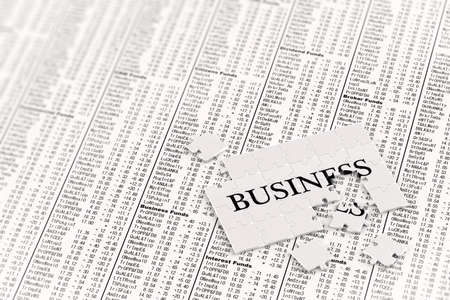 Unfinished business puzzle on stock chartsの写真素材