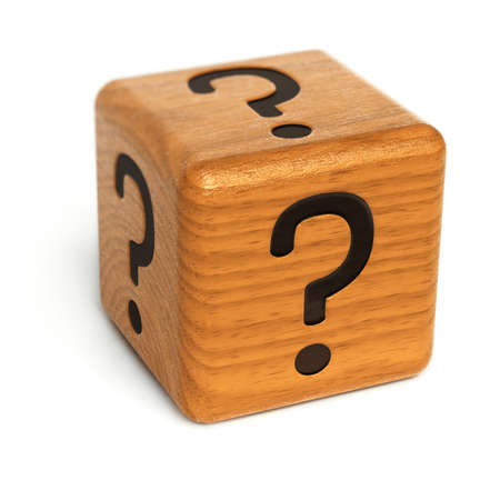 Wooden dice with question marks on it over white backgroundの写真素材