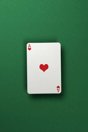 Single ace of hearts floating above green felt surface