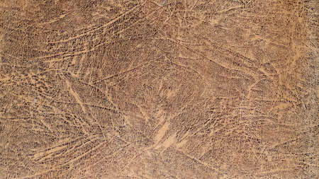 High detail macro photo of worn leather background