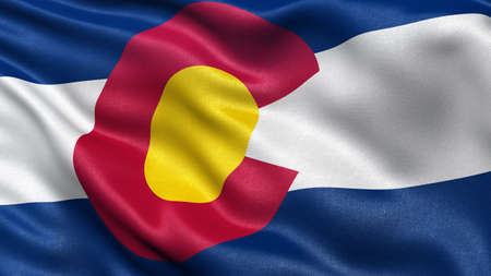US state flag of Colorado with great detail waving in the wind.の写真素材