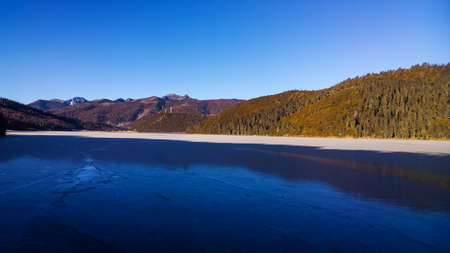 Pudacuo National Forest Park within a calm lakeの写真素材