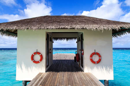 House with a spare tire in the waterのeditorial素材