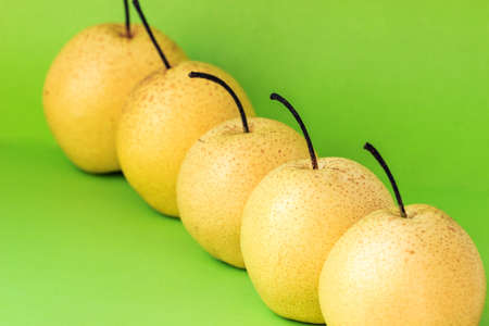 Solid color background shot of pear