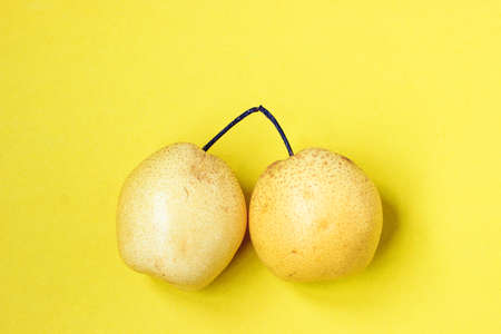 Solid color background of pearsの写真素材