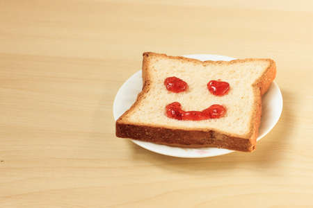 Draw happy faces of breadの写真素材