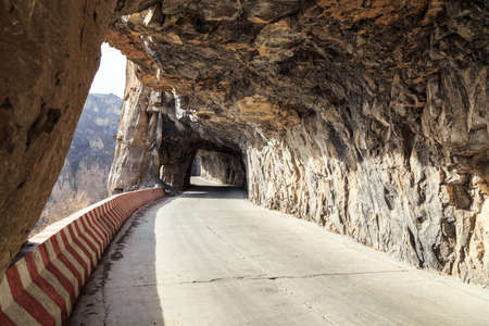 Hanging on the wall in Taihang mountain highways in Shanxi provinceの写真素材