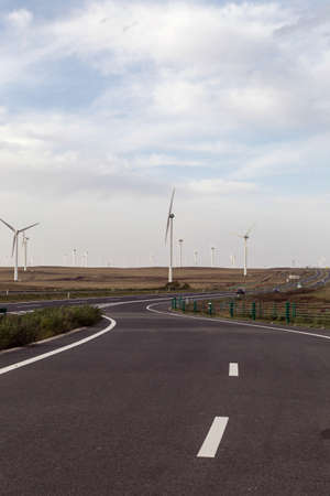 Windmill on the grasslandの写真素材