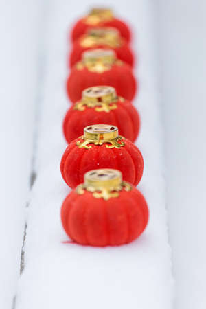 The red lanterns in the snowの写真素材