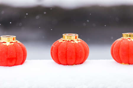 The red lanterns in the snowの写真素材