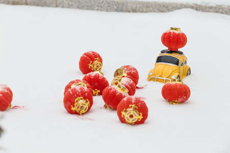Chinese new year decoration with toy cars on the snowのeditorial素材